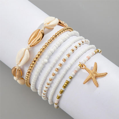 Beach bracelet for women: 7-in-1 style jewelry with starfish and shells
